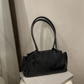 Minimalist black leather shoulder bag with glossy finish and long handles in a chic style - Black