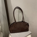 Deep brown glossy patent leather shoulder bag with long straps and vertical stitching - Brown