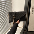 Chic black leopard print envelope crossbody bag with gold chain and ring detail - Black