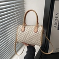 Borsa Boston con motivi geometrici e tracolla in pelle marrone in stile moderno - Bianco