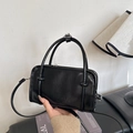 Stylish black patent leather tote bag with embossed fashion text and shoulder strap - Black