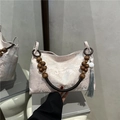 Elegant Chinese style jacquard tote bag with wooden bead handle and long tassel charm - Pink