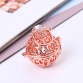 Detailed close-up of rose gold hollow pendant with zircon stone and heart pattern - Rose Gold - Pendant Only (Without Chain)