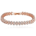 Bracelet entrelacé en or rose avec double rangée de zircons AAA et fermoir pliable - Or rose