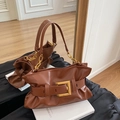 Dark brown pleated shoulder bag with gold metal buckle and chunky chain handle - Brown