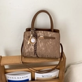 Detail of vintage brown PU tote with vertical texture and baseball bat charm ornament - With Pendant / Brown