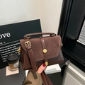 Retro brown crossbody bag in mixed leather finish with elegant gold hardware - Brown