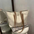Minimalist white leather tote bag with brown straps and gold metal plaque detailing - White
