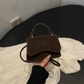 Chic dark brown square crossbody bag with wavy flap and top handle in matte finish - Brown