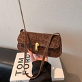 Chic leopard print underarm bag with golden oval buckle and sleek brown shoulder strap - Brown