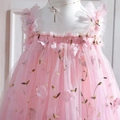 Detailed view of pink girls' dress featuring 3D floral appliques and lace embroidery - Flower Pink