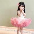 Meisjesoutfit met roze gelaagde tutu rok en wit opengewerkt gebreid vest met strik - Bottoms / Perzikroze / 90cm
