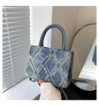 Chic blue denim crossbody bag with quilted frayed texture and leather handles - Blue