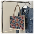 Borsa tote in lino blu navy con jacquard floreale e manici rotondi intrecciati - Stile 1