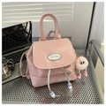Pink mini leather bucket backpack with silver hardware and cute plush monster charm - Pink (With Pendant)