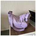 Detail of light purple crescent canvas crossbody bag with textured grid and mini coin purse - No Pendant / Purple