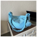 Close-up of light blue canvas hobo bag with adjustable strap and small round coin purse - No Pendant / Blue