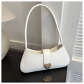 Detail of white baguette shoulder bag featuring golden heart buckle and smooth finish - White