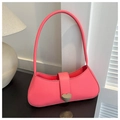 Detailed view of the hot pink shoulder bag featuring a silver heart-shaped buckle - Rose Red