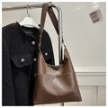 Brown leather large tote bag with front pocket and shoulder strap in minimalist style - Coffee