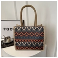 Linen tote bag with navy and orange geometric patterns and rope handles on a white table - Blue Orange Geometric (Style 5)