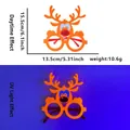 Orange reindeer party glasses with neon fluorescent glow effect for Christmas - Elk Style