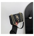Elegant black leather square bag with V-shaped quilting and gold chain strap and tassel - Black