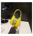 Mini yellow saddle bag with green flap and silver metal bow featuring chain strap - Small / Yellow