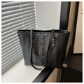 Close-up of black herringbone quilted tote bag with FASHION & BAGS logo detail - Black without Pendant
