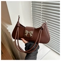 Elegante borsa sottobraccio in similpelle testa di moro con fiocco metallico argentato - Marrone