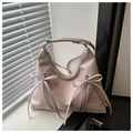 Pale pink-purple fashion bucket bag with decorative ribbon bows and smooth leather finish - Pink