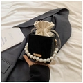 Elegant black velvet bucket bag with large pearl handle and gold chain strap - Black