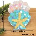 Sparkly sequin seashell hair clip with starfish for ocean theme parties, 7cm x 5.5cm - Iridescent Blue Sequin Shell