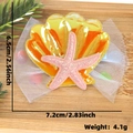 Starfish bow hair clip for girls with yellow shell and pink glitter starfish detail - Hair Clip / Dreamy Yellow Shell