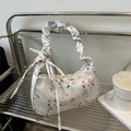 Sac bandoulière floral avec anse plissée et détail de nœud sur tissu blanc - Gris