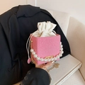 Pink striped bucket bag with large pearl handle and drawstring leather closure - Pink