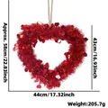 Couronne de cœur en guirlande rouge avec paillettes et dimensions de 44x43cm - Grand / Rouge