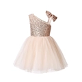 Dettaglio del corpetto con paillettes e fiocco su un abito da festa in tulle rosa - 100cm / Champagne