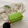 Chic green quilted crossbody bag with golden V-stitch pattern and chain strap - Green
