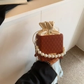 Brown checkered square handbag with large pearl handle and drawstring lining detail - Brown