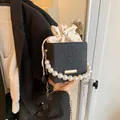 Chic black and white checkerboard square bucket bag with luxury pearl handle and chain - Black
