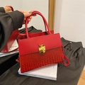 Retro red faux leather handbag with crocodile pattern and golden metal buckle detail - Red