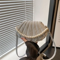 Minimalist shell-shaped crossbody bag in light grey with faux pearl handle and pleats - Silver