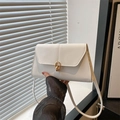 Minimalist white faux leather shoulder bag with elegant gold buckle detail - White