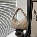 Minimalist beige corduroy crossbody bag with wide shoulder strap and half-moon design - Khaki