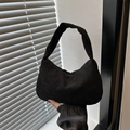 Minimalist black corduroy crossbody bag with vertical ribbed texture and shoulder strap - Black