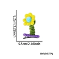 Handmade flower hair clip crafted from colorful plush twists with size dimensions - Standing Yellow Flower Hair Clip