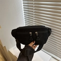 Black corduroy crossbody chest bag with adjustable strap and multiple zipper pockets - Black