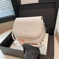 Chic beige saddle bag with Fashion Trend print in a black luxury gift box presentation - White