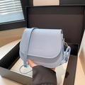Minimalist light blue saddle bag in premium synthetic leather with adjustable shoulder strap - Blue